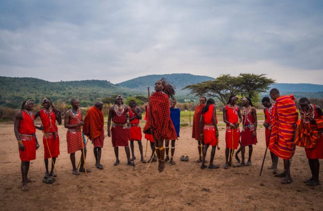 Visiting a Maasai Village - Young Maasai warrior doing the jumping dance FREETOBEBRI.COM