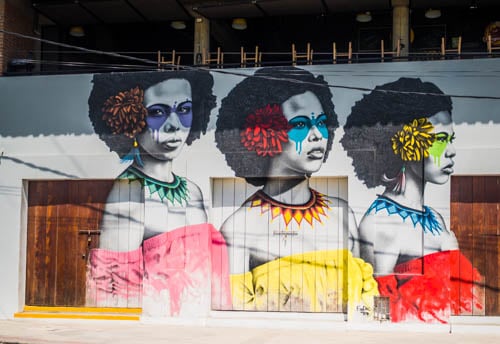 Three Afro Latina women depicted in street art in Cartagena Colombia