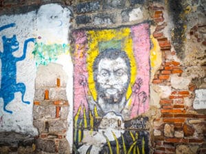 Black Latino man street art in Cartagena Colombia